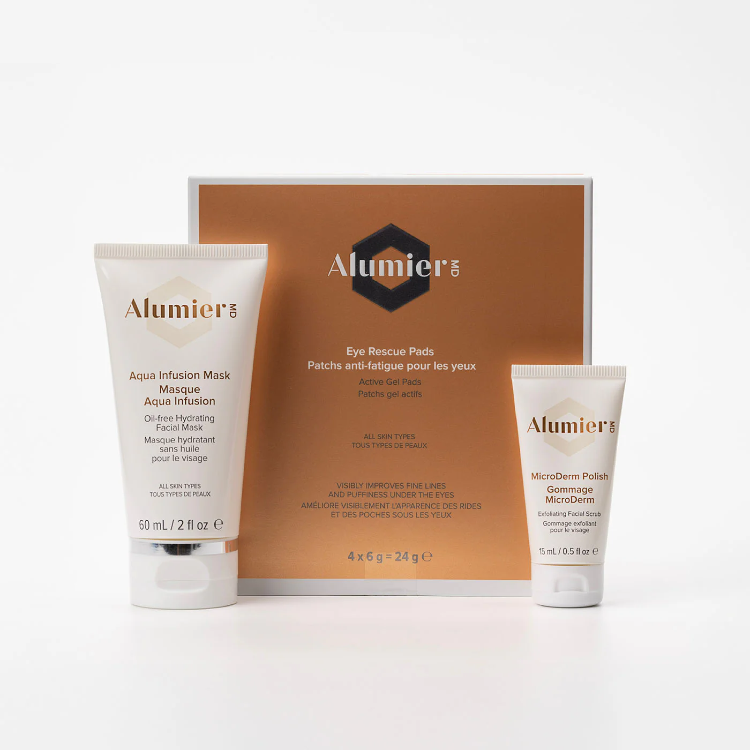Wedoskin Alumier HydraGlow Energizing Gift Set featuring skincare products in a sleek limited-edition packaging.
