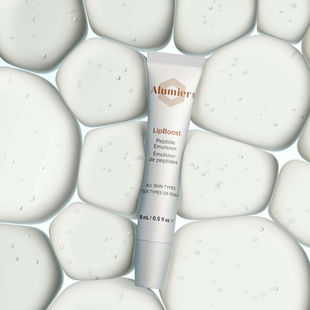 Wedoskin Alumier LipBoost tube with applicator for lip hydration and plumping, part of eyes, neck, and lips skincare line.
