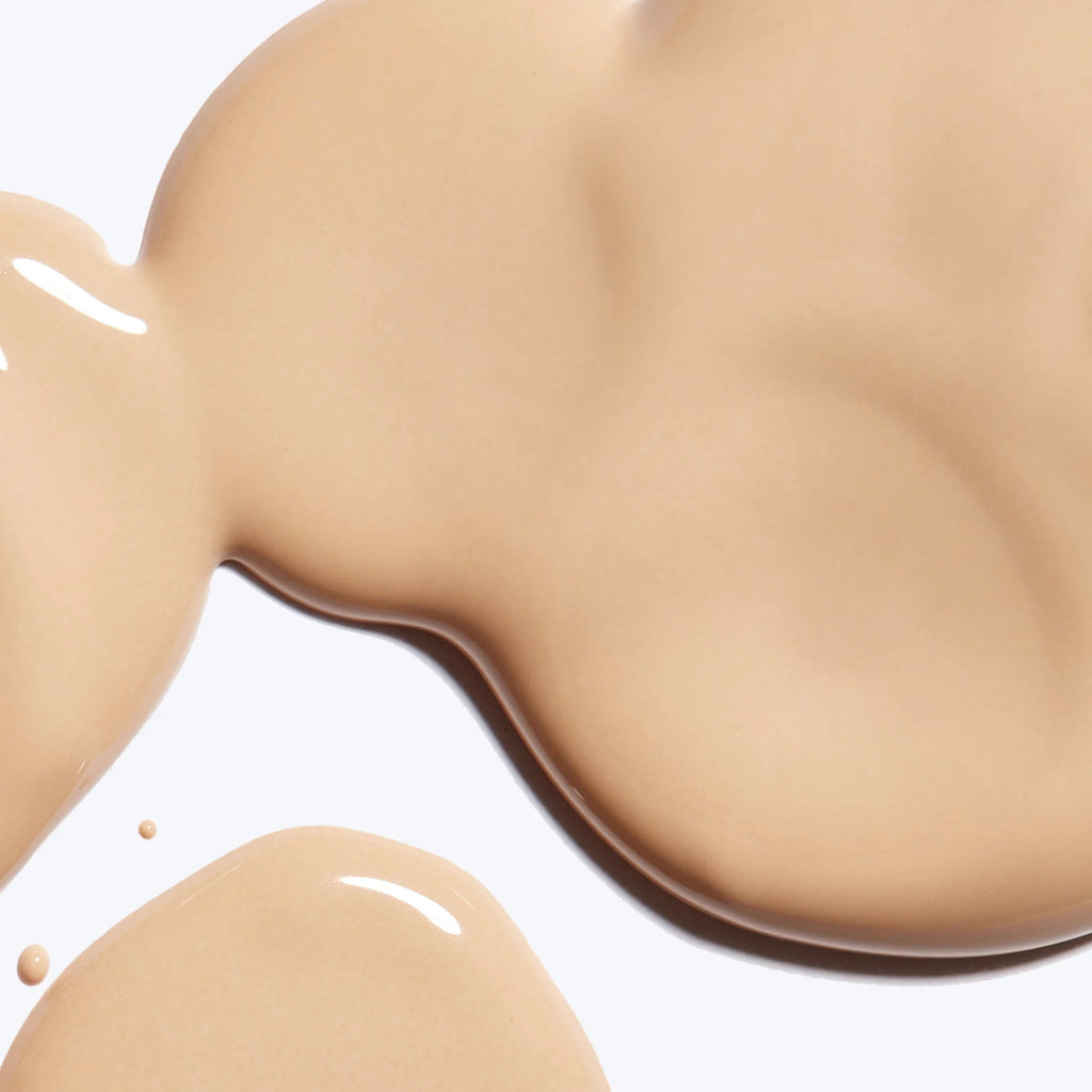 Travel size Alumier Sheer Hydration Broad Spectrum SPF 40 tinted moisturizer by wedoskin, in a 15ml bottle.
