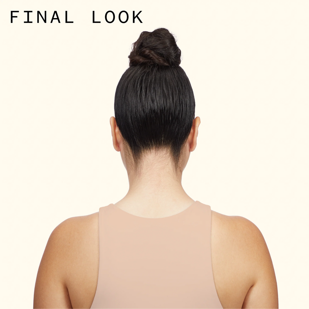 Travel-size Amika Headstrong Intense Hold Hairspray by wedoskin, showing a sleek bottle for strong, long-lasting hairstyle hold.