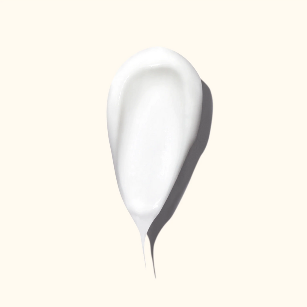 Amika Hydro Rush Intense Moisture Conditioner bottle showing sleek packaging and product label on a white background.
