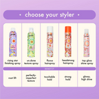 Amika Rising Star Finishing Spray by wedoskin, a styling product in a spray bottle for shiny, set hair looks.