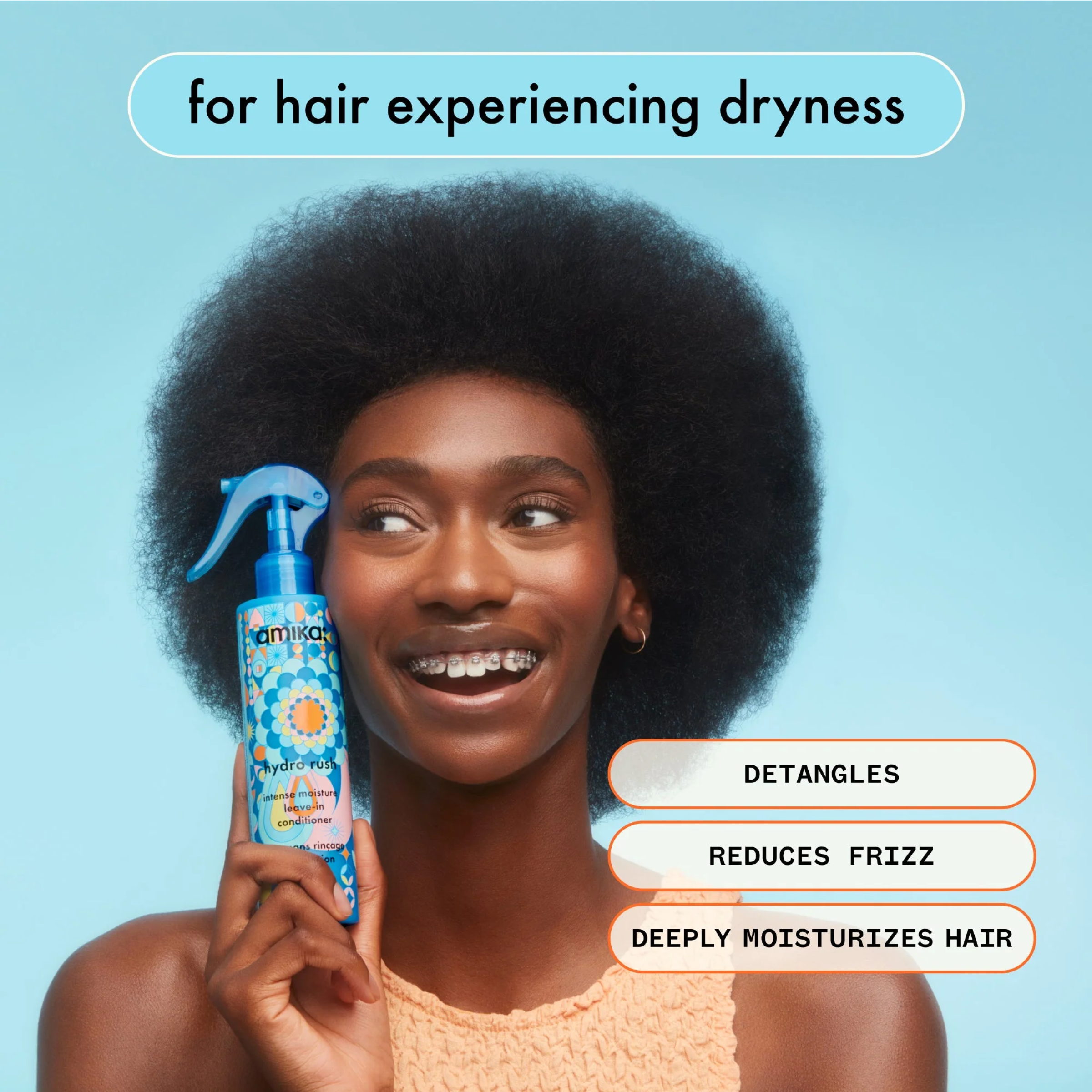 Amika Hydro Rush Intense Moisture Leave-In Conditioner in a pump bottle, designed for dry hair to provide deep hydration.