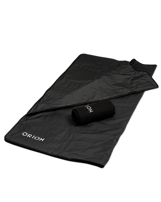 Black Orion Embers Sauna Blanket with a matching black towel, showing its soft fabric and snug, thermal design for relaxation.