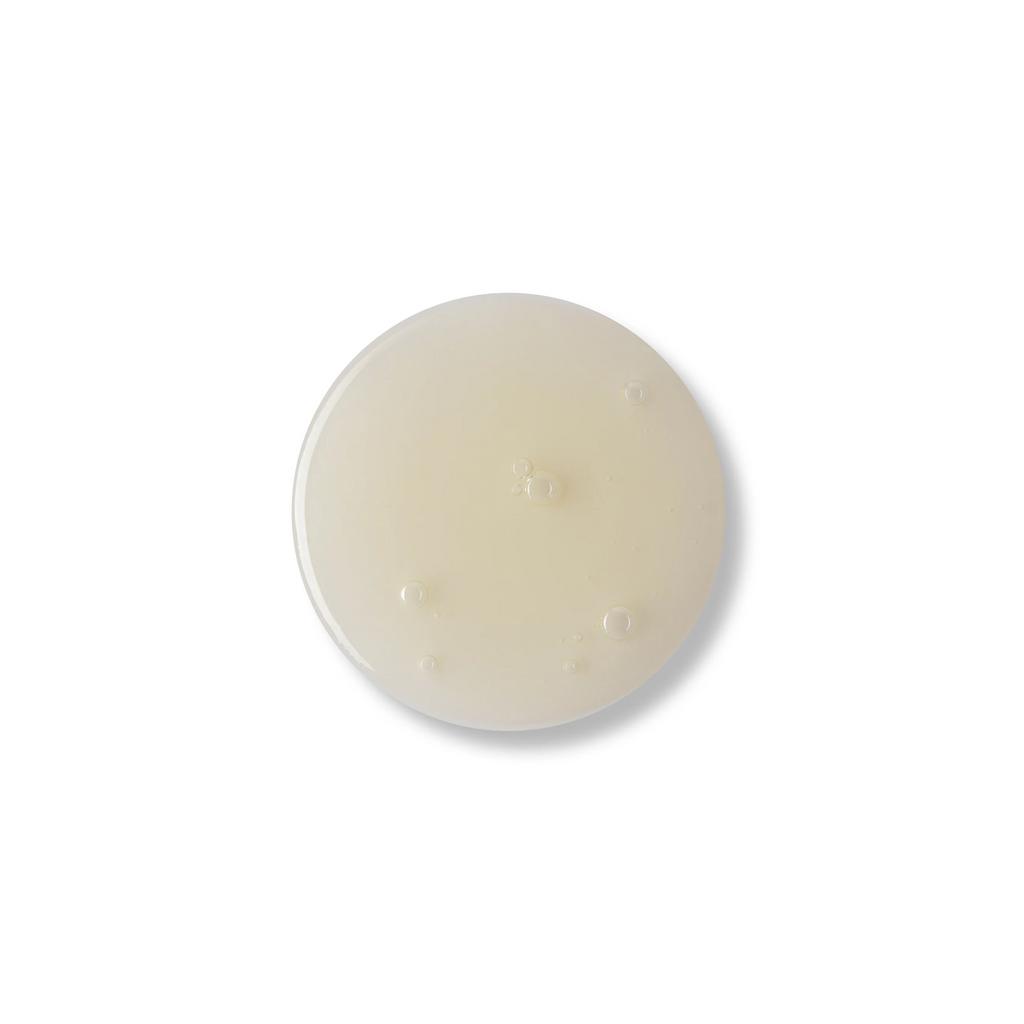 GM Collin Dark Spot Serum by wedoskin, featuring a sleek glass bottle with dropper for targeted skincare treatment.