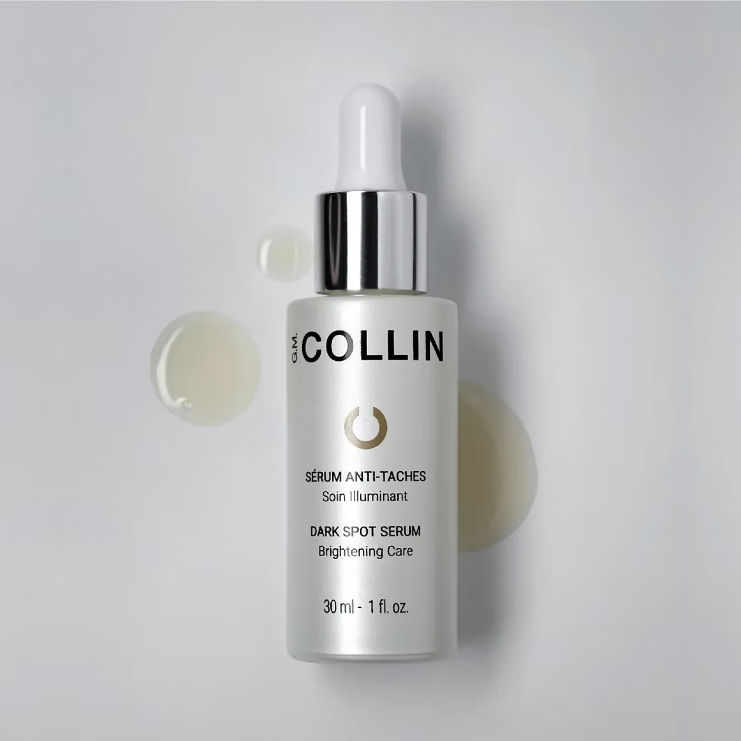 GM Collin Dark Spot Serum bottle with dropper, skincare concentrate for reducing dark spots and evening skin tone.