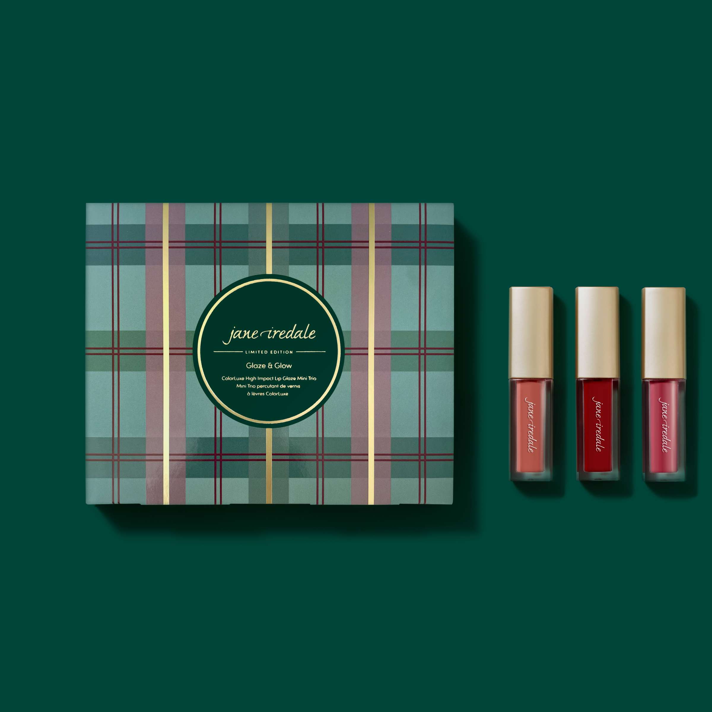 Jane Iredale Colorluxe High Impact Lip Glaze Mini Trio set featuring glossy lip glosses in various shades on a white background.