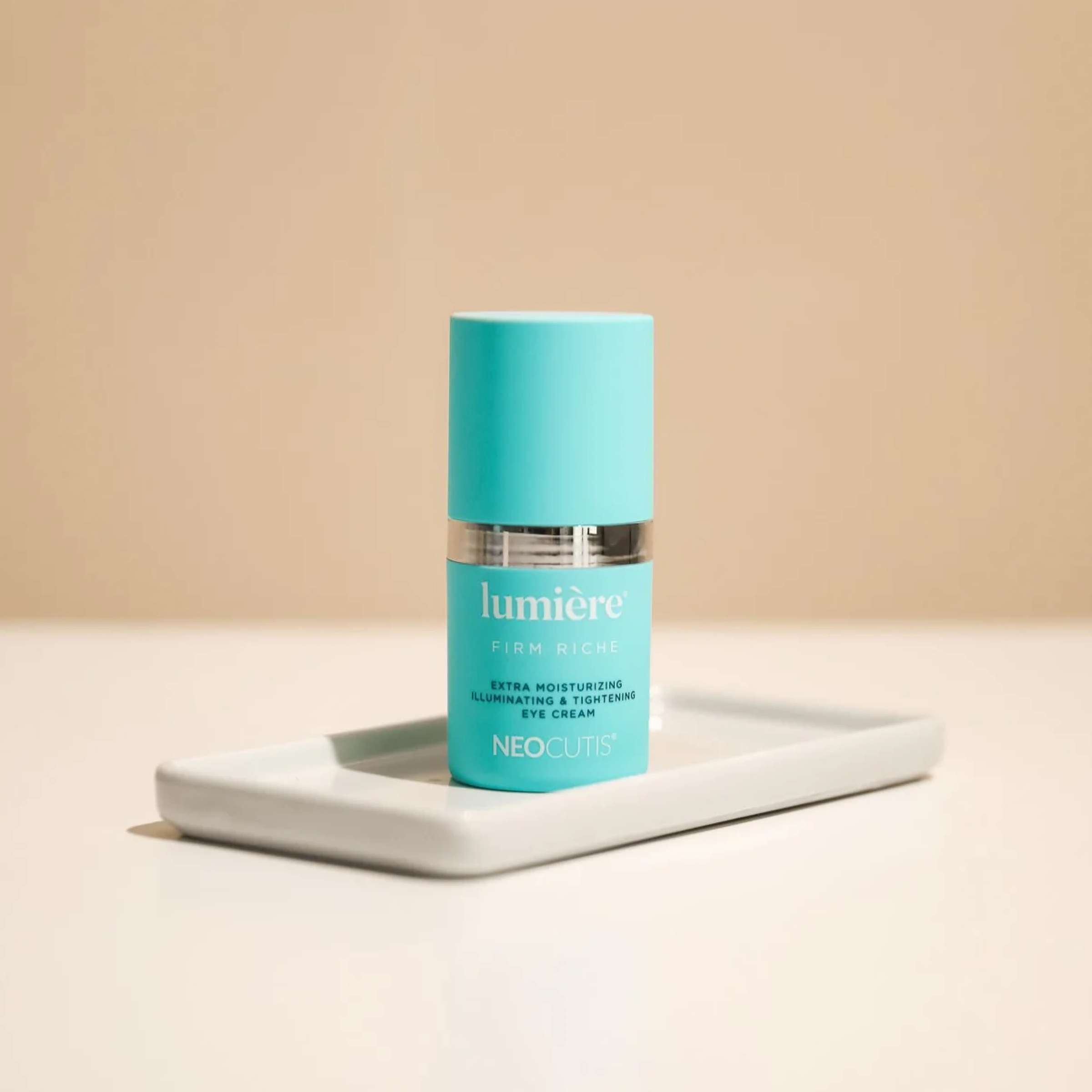 Neocutis Lumière Firm Riche Eye Cream jar with the product label, designed for eyes, neck, and lips skincare.