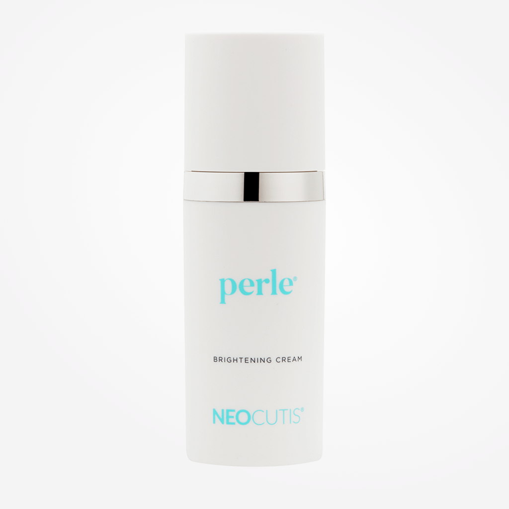 Neocutis Perle Cream moisturizer in a jar, designed for brightening and hydrating skin with a smooth, creamy texture.