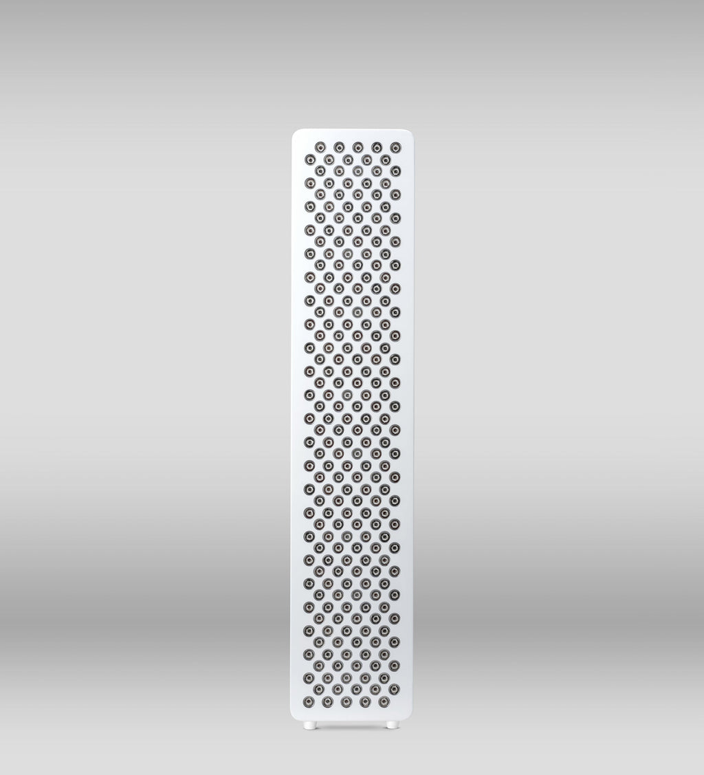 Red light therapy device Orion One Plus, with sleek design and red LED lights, used for skin and wellness treatments.