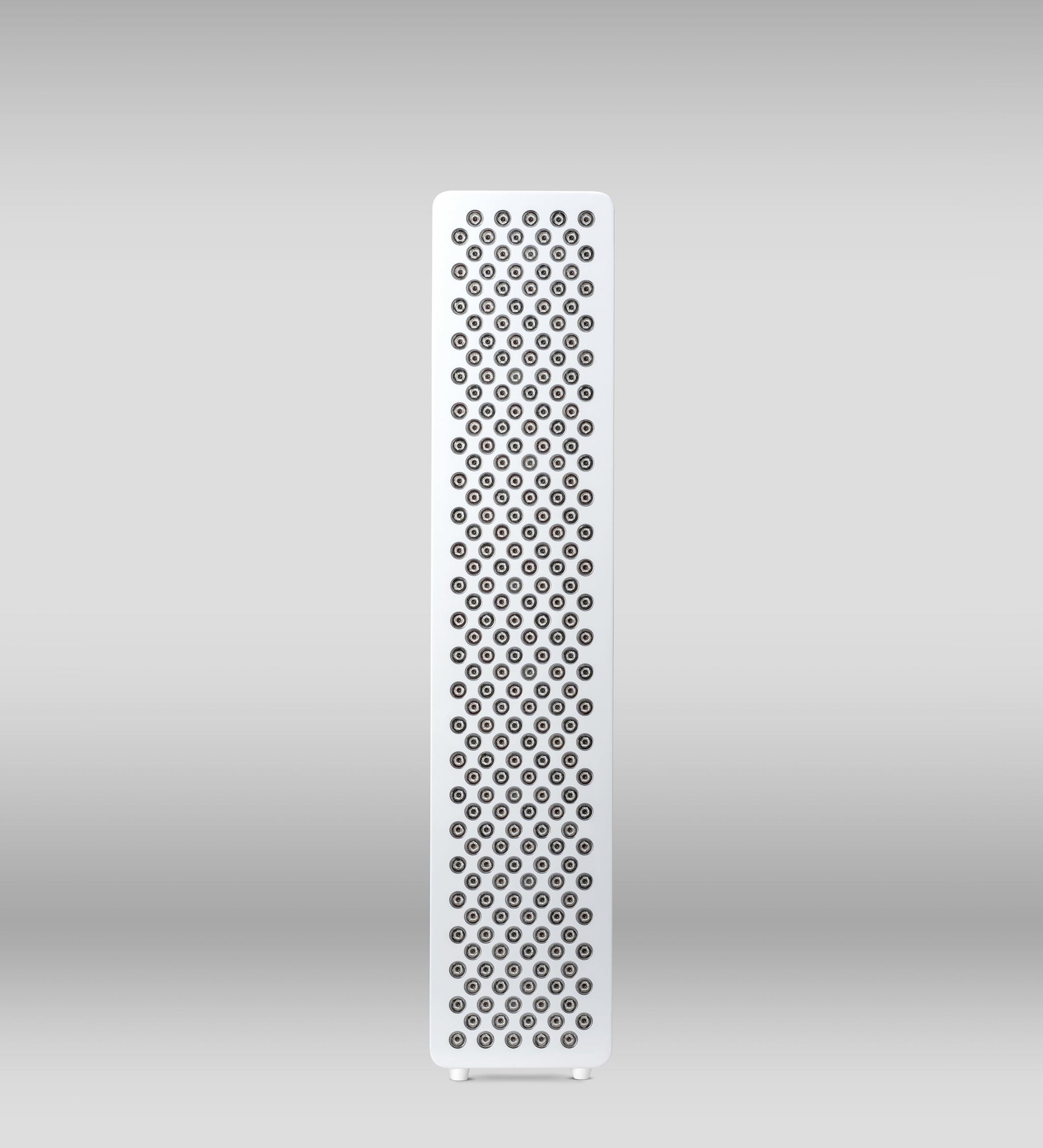 Red light therapy device Orion One Plus, with sleek design and red LED lights, used for skin and wellness treatments.