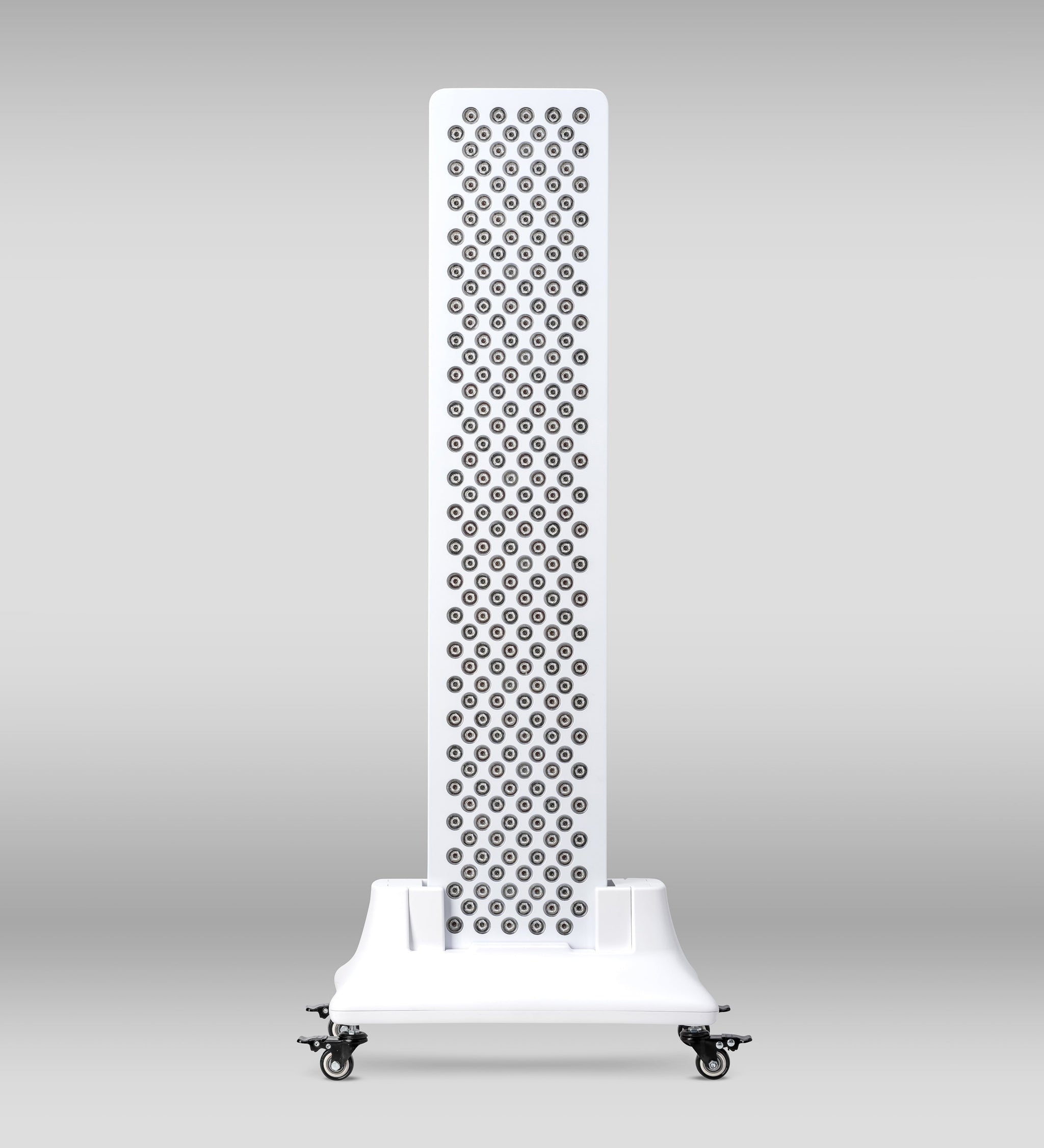 Orion One Plus red light therapy device with stand, designed for targeted skin and pain treatment, positioned on a clean surface.