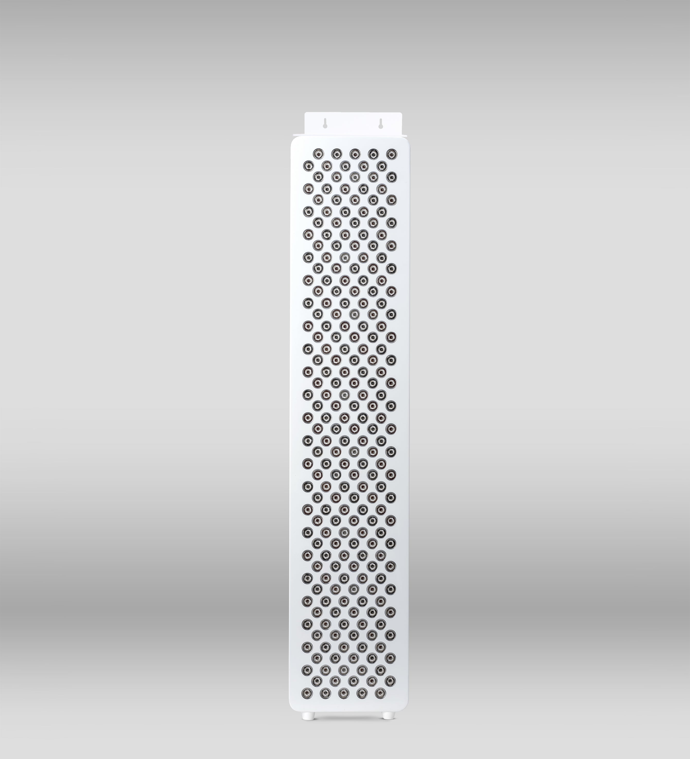 Red light therapy device Orion One Plus wall-mounted unit showing sleek design and red light panels for skin and pain therapy.