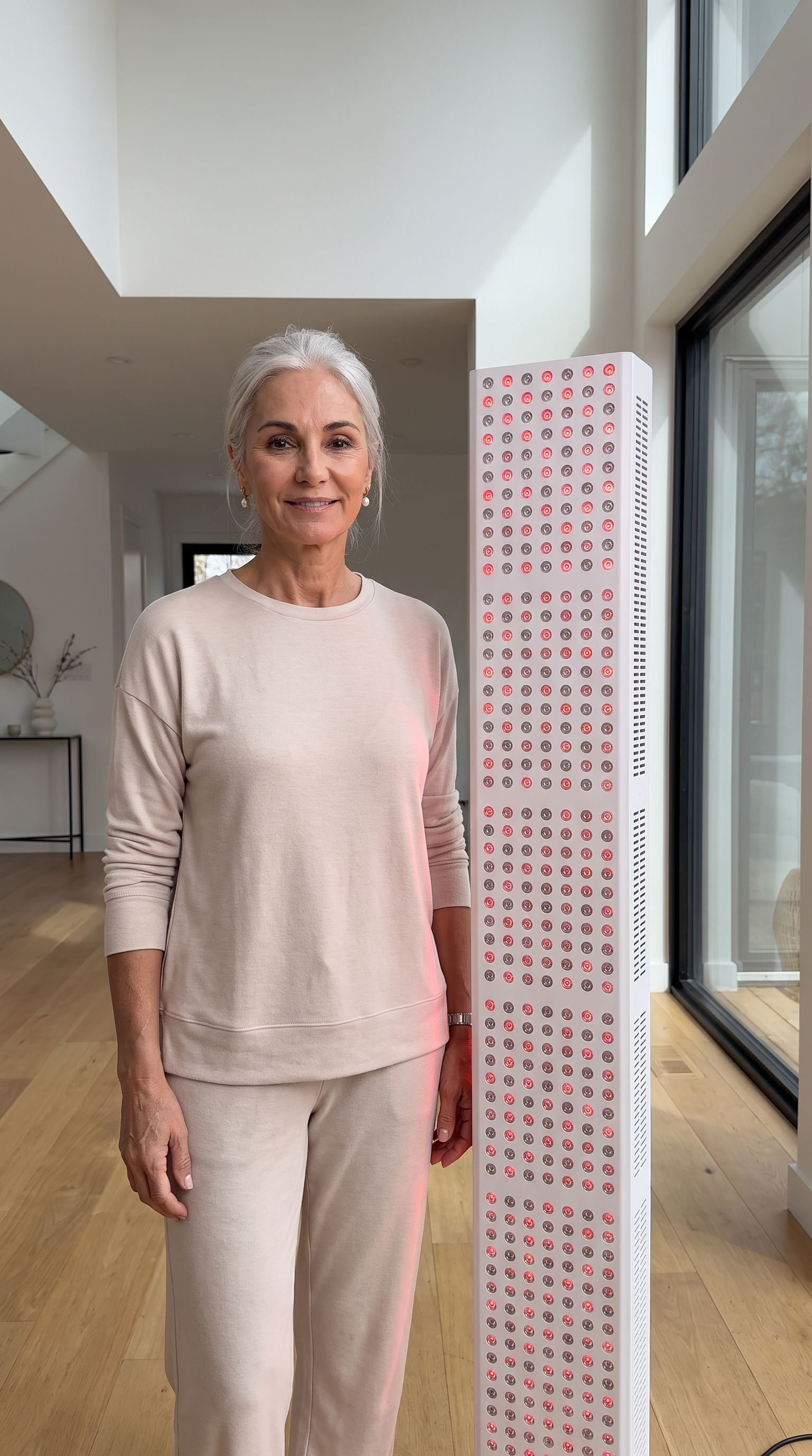 Orion Pro 1800 red light therapy device showcasing its sleek design and red LED light panels for skin therapy.