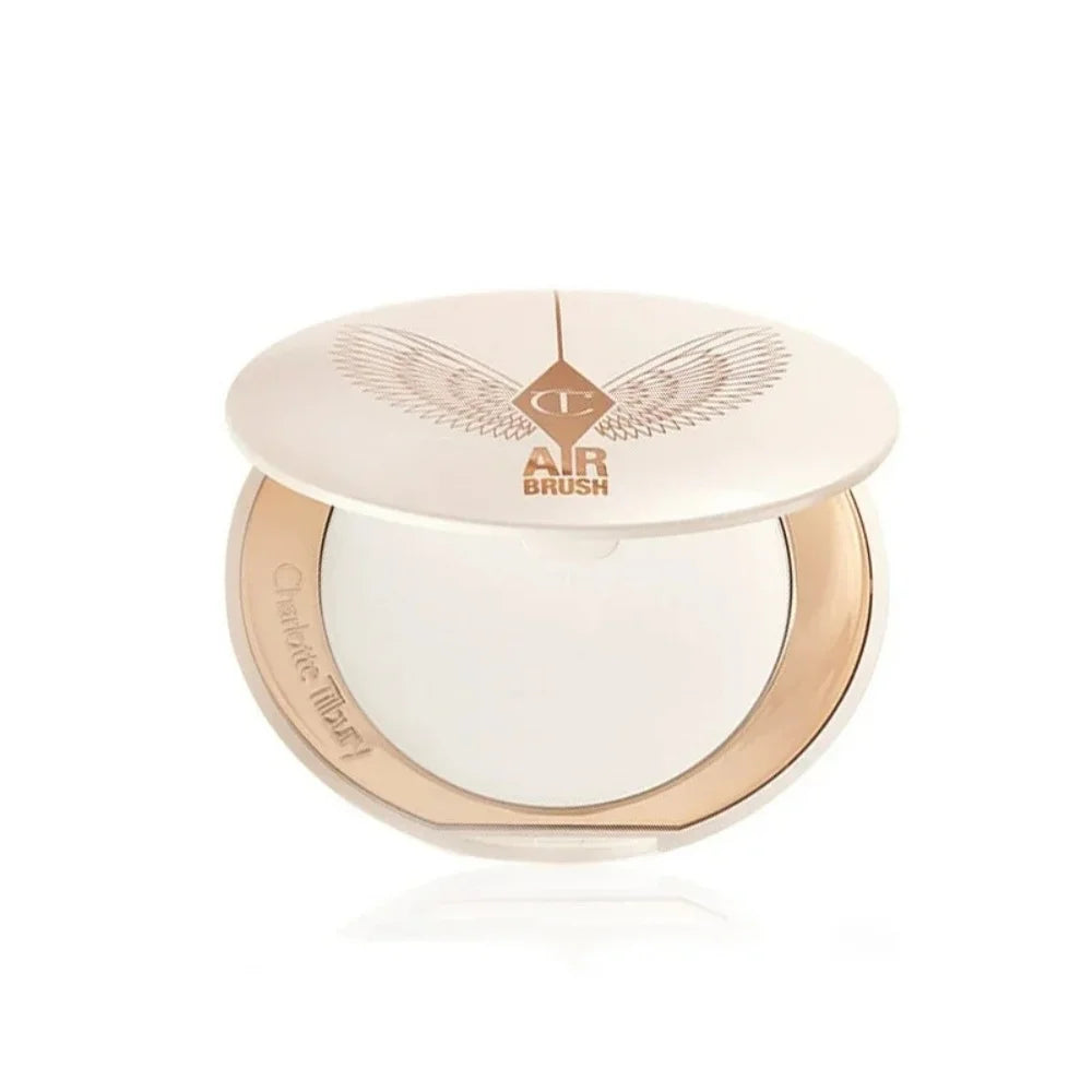 Charlotte Tilbury makeup product from MediSpa Aesthetica Shop, featuring elegant packaging and application tools.
