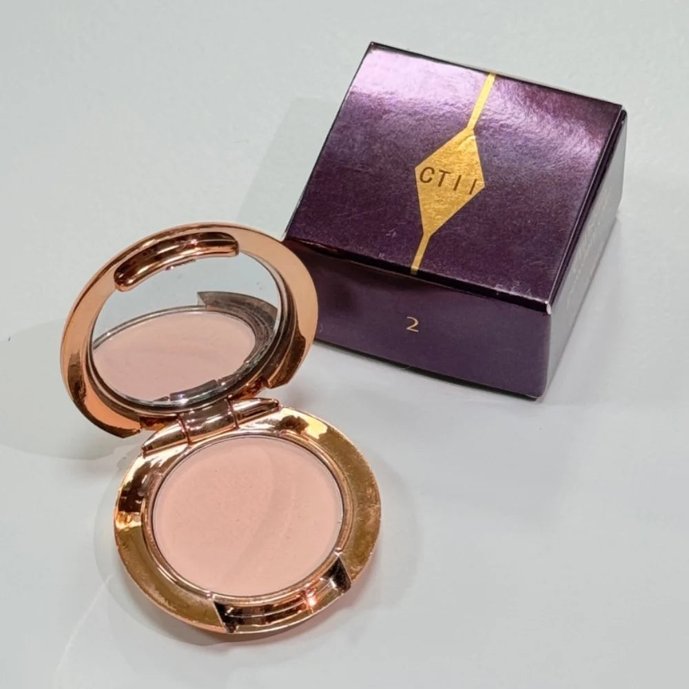 Makeup products from MediSpa Aesthetica Shop, featuring Charlotte Tilbury branding, displayed in a sleek, professional setup.