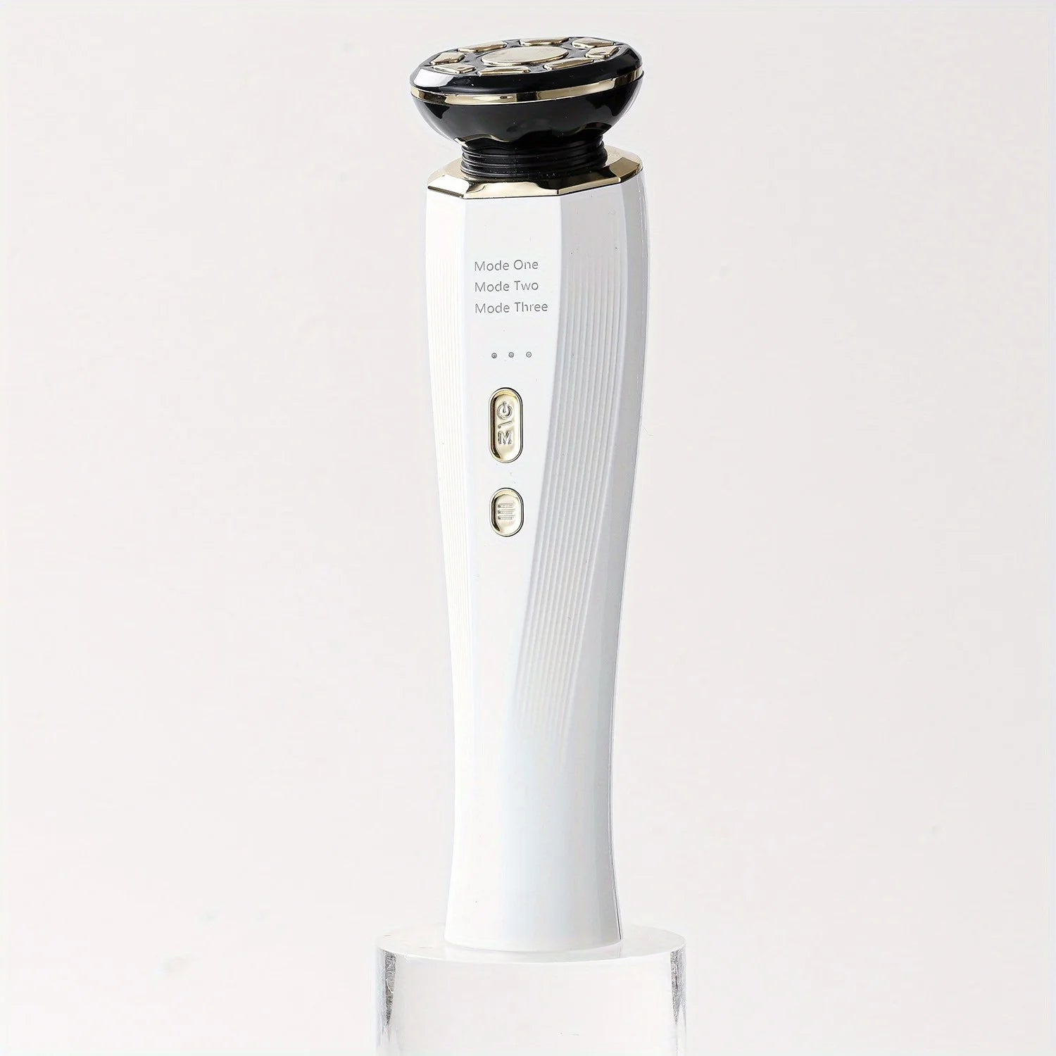 MediSpa Aesthetica EMS RF & LED Photon Beauty Device for anti-aging, featuring a sleek handheld design with LED lights and control buttons.