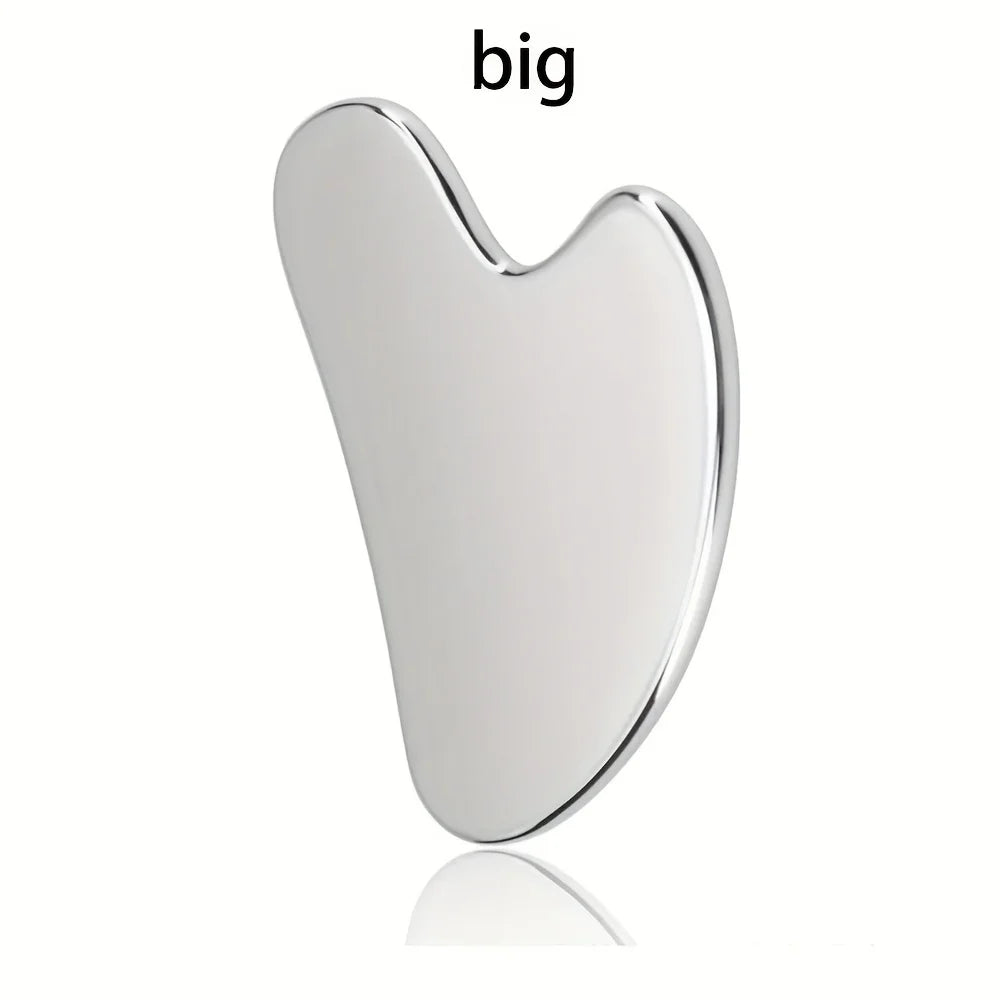 Stainless steel Gua Sha facial tool from MediSpa Aesthetica, showing smooth, curved design for facial massage and skincare.