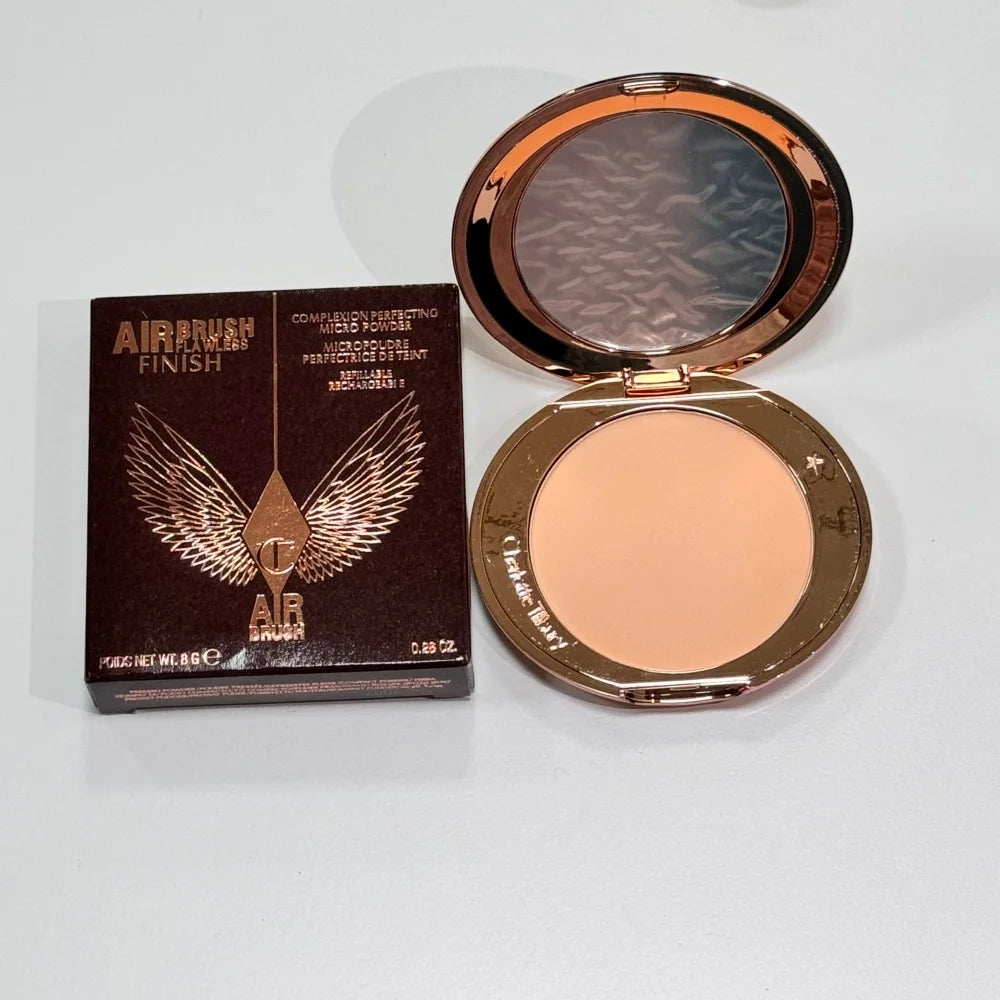 Charlotte Tilbury makeup products displayed on MediSpa Aesthetica Shop, featuring various cosmetic items arranged neatly.