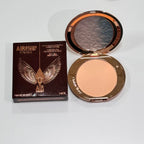 Charlotte Tilbury makeup products displayed on MediSpa Aesthetica Shop, featuring various cosmetic items arranged neatly.