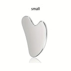Stainless steel Gua Sha facial tool from MediSpa Aesthetica Shop, shaped for facial massage and skin contouring.