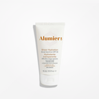 Wedoskin Alumier Sheer Hydration Broad Spectrum SPF 40 tinted travel size sunscreen in a compact 15ml tube