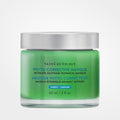SkinCeuticals Phyto Corrective Mask in a clear jar, featuring a calming clay and botanical ingredients for soothing skin treatment.