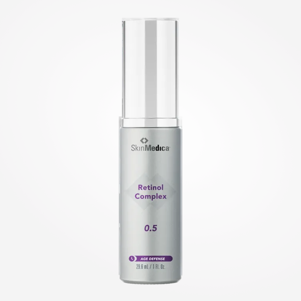 SkinMedica Retinol Complex 0.5 bottle with dropper, a skincare product in a white and gold box for anti-aging and skin renewal.
