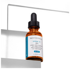 SkinCeuticals Serum 10 AOX+ bottle showing clear glass container with dropper cap, containing antioxidant serum.