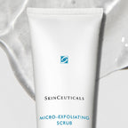 SkinCeuticals Micro-Exfoliating Scrub in a jar, showing the textured exfoliating product with small beads for gentle skin renewal.