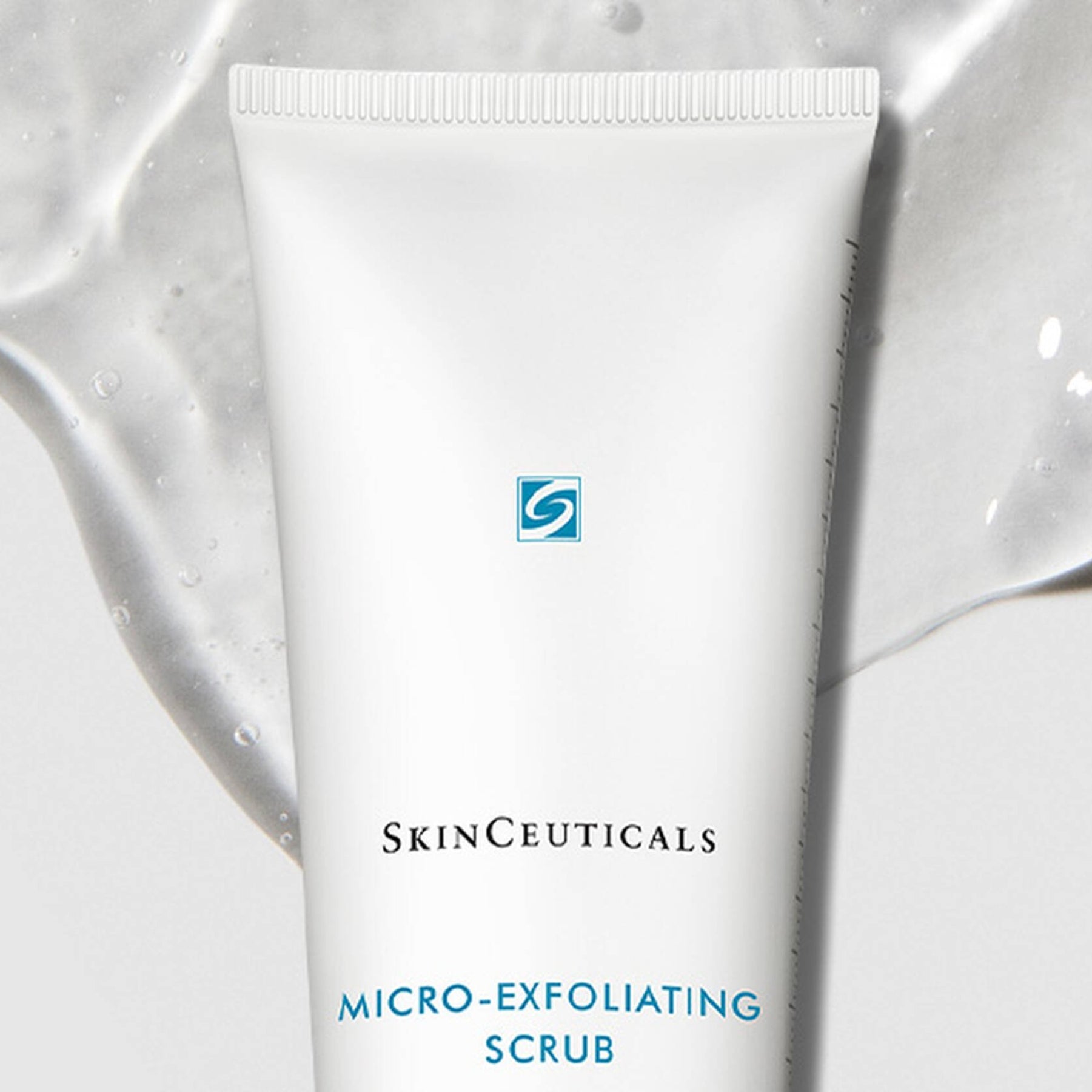 SkinCeuticals Micro-Exfoliating Scrub in a jar, showing the textured exfoliating product with small beads for gentle skin renewal.