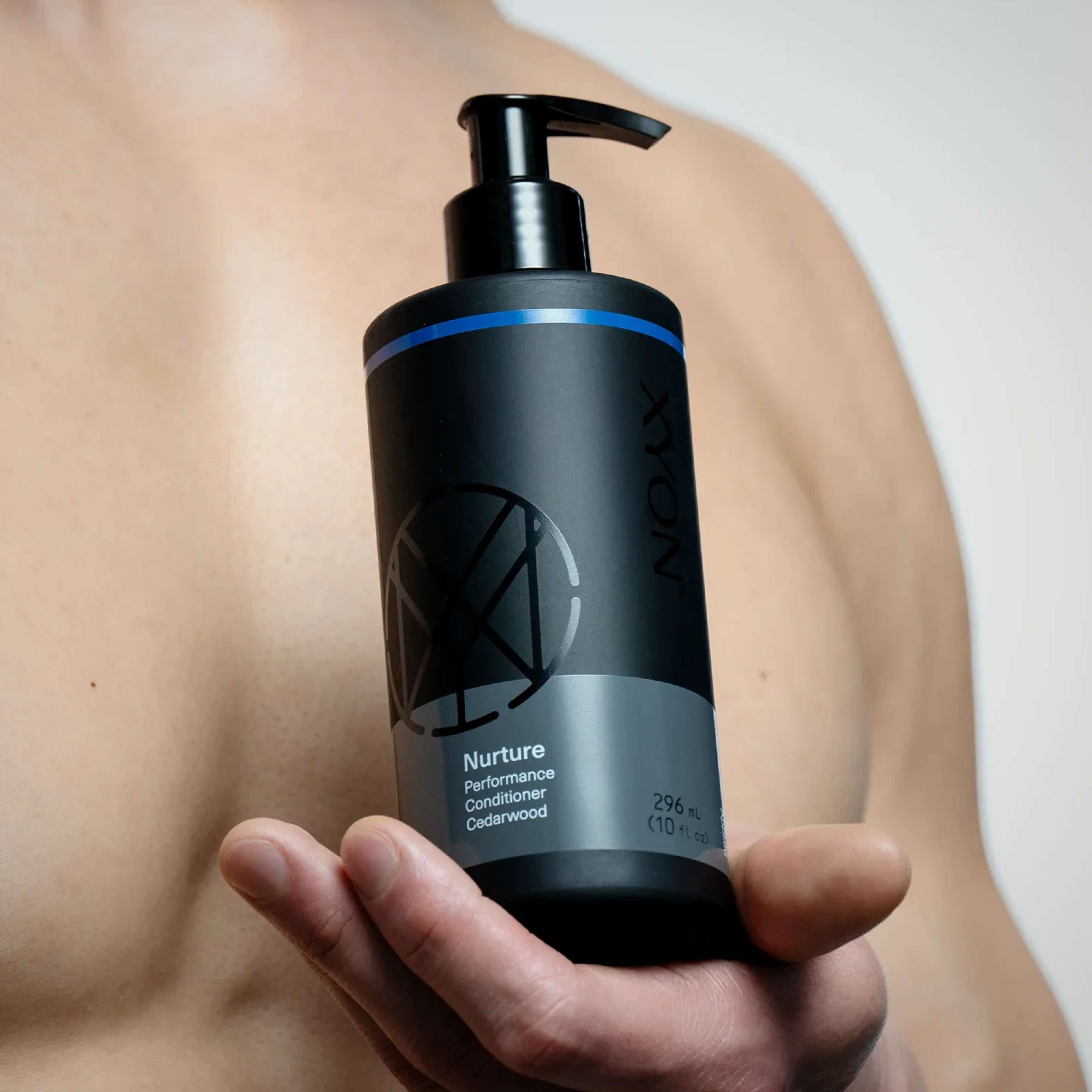 XYON Nurture Performance Conditioner for Men by wedoskin, featuring DHT-blocking formula in a sleek conditioner bottle.