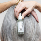 XYON Revitalize hair-boosting serum for women, in a sleek bottle, designed to strengthen and rejuvenate damaged hair.