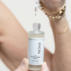 XYON Revitalize Hair-Boosting Serum for women, a hair repair serum showing the product bottle and applicator.