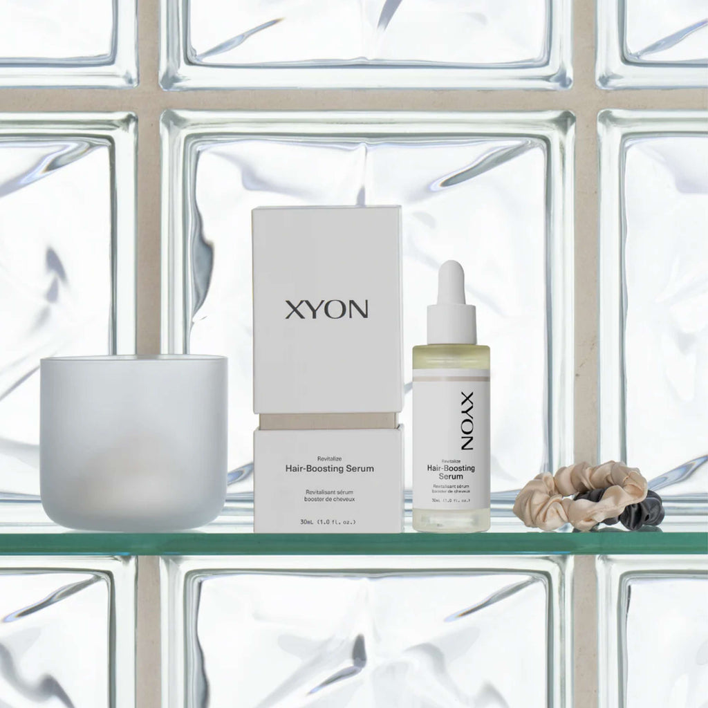 XYON Revitalize Hair-Boosting Serum for women, bottle of hair repair serum with dropper applicator, branded by wedoskin.