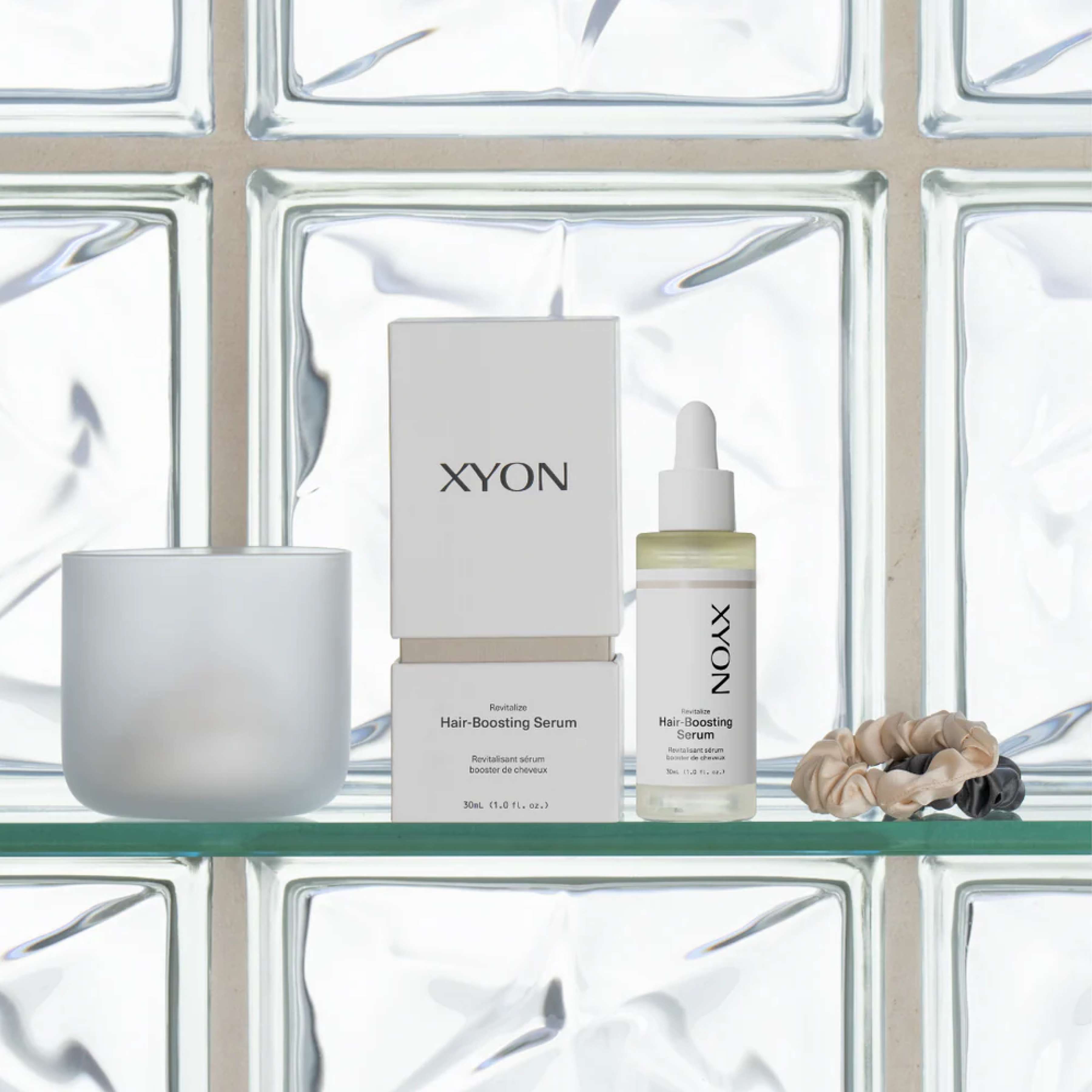 XYON Revitalize Hair-Boosting Serum for women, bottle of hair repair serum with dropper applicator, branded by wedoskin.