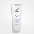 Wet skin with ZO Skin Balancing Cleansing Emulsion from wedoskin, a gentle facial cleanser in a white bottle.