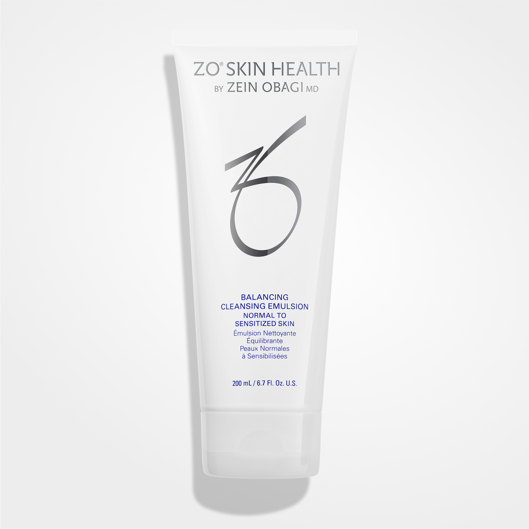 Wet skin with ZO Skin Balancing Cleansing Emulsion from wedoskin, a gentle facial cleanser in a white bottle.
